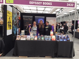 From left to right: Rachel Drummond (zombie queen), Jenny Ealey (sorceress) and me (rocking the Yoda t-shirt) in the Odyssey Books booth at OzComicCon, Sydney.